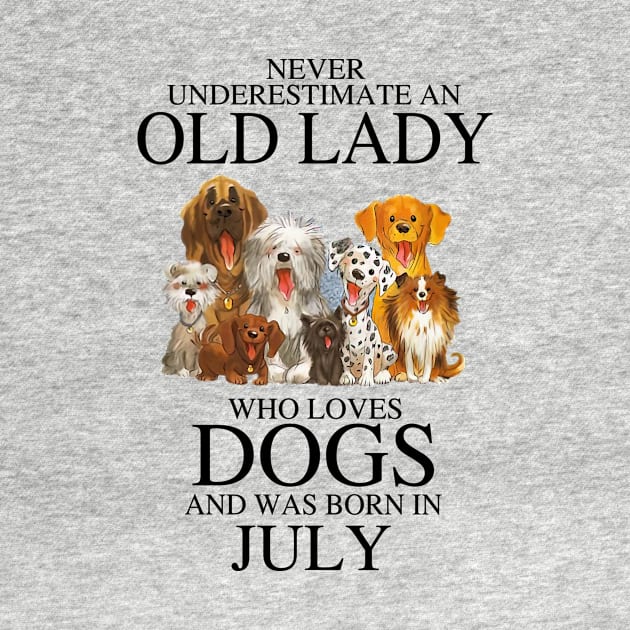 Never Underestimate An Old Lady Who Loves Dogs And Was Born In July by louismcfarland